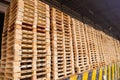 Wooden pallets stack at the freight cargo warehouse for transportation and logistics industrial Royalty Free Stock Photo