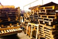 Wooden pallets stack at the freight cargo warehouse for transportation and logistics industrial at Bangkok