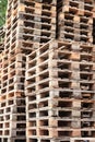 Wooden pallets stacked high stock photo