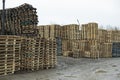 Wooden pallets. Warehouse of wooden products on street. Industrial zone Royalty Free Stock Photo