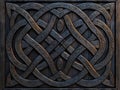 A wooden panel with a celtic design on it Royalty Free Stock Photo