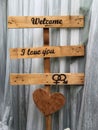 Wooden panel of love. Couple in love .Wedding welcome sign. Royalty Free Stock Photo
