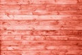 Wooden pannels texture colored in color of year 2019 Living Coral background. Bright Macro color 16-1546 background. Retro gate Royalty Free Stock Photo
