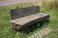 wooden park bench with a \