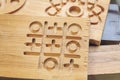 Wooden part blank with 3D patterns. Wood Details after processing on cutting machine, 3D wood cnc router. Cutter controlled by Royalty Free Stock Photo