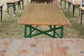 Wooden party tables and benches Royalty Free Stock Photo