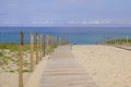 Wooden path access in sand dune beach at Cap-Ferret ocean atlantic arcachon in gironde france Royalty Free Stock Photo