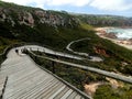 Wooden path going down the Mosselbay hiking trails Royalty Free Stock Photo