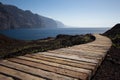 Wooden path at ocean - travel destinaton background Royalty Free Stock Photo