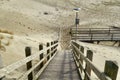 Wooden pathway leading down to a sandy beach Royalty Free Stock Photo