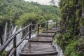 Wooden pathway near big waterfall, Plitvice Lakes National Park, Croatia Royalty Free Stock Photo