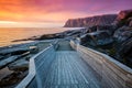 Wooden pathway on the rocky beach Royalty Free Stock Photo