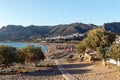 Wooden pathway to sandy beach at Palaiochora town at southern part of Crete island, Greece. Royalty Free Stock Photo