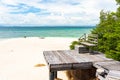 Wooden pathway and wooden chair built on a rocky coast  at Koh Munnork island , Rayong, Thailand Royalty Free Stock Photo