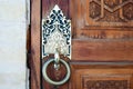 Wooden pattern in door with boor handle in Tashkent, Uzbekistan