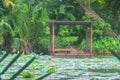 Wooden pavilion locate nearly the lake.