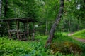 Wooden pavilion at Terrenkur Old mill health trail along Belokurikha river Royalty Free Stock Photo