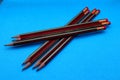 red color striped wooden pencil with eraser