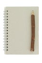 Wooden pencil and recycled notebook
