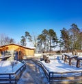 Wooden pens for animals on the territory of the Riga Zoo near Kisezers lake