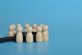 Wooden people of figures standing together.discussing, problem solving, meeting corporate success brainstorming teamwork concept Royalty Free Stock Photo