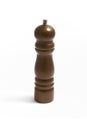 Wooden pepper grinder on white