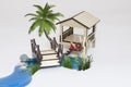 Wooden pergola maquette and small lake with wooden bridge Royalty Free Stock Photo