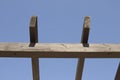 A wooden pergola with the sky in the background Royalty Free Stock Photo