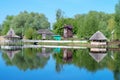 Wooden pergolas on the river bank, mill