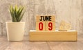 Wooden Perpetual Calendar set to June 9th