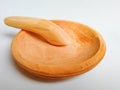 Wooden pestle and mortar in Indonesia called ulekan dan cobek, on white background Royalty Free Stock Photo