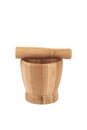 Wooden pestle on a wooden mortar isolated on a white background. Royalty Free Stock Photo