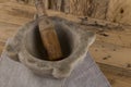 Wooden pestle and stone mortar Royalty Free Stock Photo