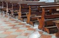 wooden pews inide a Catholic church