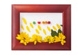 Wooden photo frame with yellow flowers on a white background. Hello autumn concept Royalty Free Stock Photo