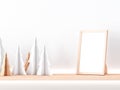 Wooden photo frame Mockup on shelf with paper christmas trees