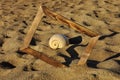 Wooden photo frame  sea shell on the sand at dawn. Royalty Free Stock Photo