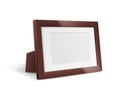 Wooden photo frame standing over white background. Realistic frame for picture Royalty Free Stock Photo