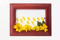 Wooden photo frame with yellow flowers on a white background. Hello autumn concept Royalty Free Stock Photo