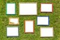 Wooden photo frames on spring lawn Royalty Free Stock Photo