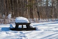 Wooden Picnic Table Covered in Snow Royalty Free Stock Photo