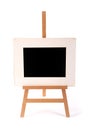 Wooden picture frame on a easel isolated on white Royalty Free Stock Photo