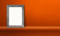 Wooden picture frame leaning on orange shelf. 3d illustration. Horizontal banner Royalty Free Stock Photo