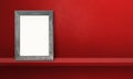 Wooden picture frame leaning on a red shelf. 3d illustration. Horizontal banner Royalty Free Stock Photo