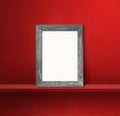 Wooden picture frame leaning on a red shelf. 3d illustration. Square background Royalty Free Stock Photo