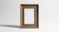 Wooden picture frame with a rectangular shape and a natural wood grain texture. The Royalty Free Stock Photo