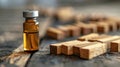 Wooden pieces domino effect stopping fall with vial vaccine, next to stand wooden pieces Vaccine stopping crisis and Royalty Free Stock Photo