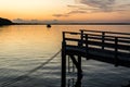 Wooden pier at the Baltic Sea during a beautiful colorful sunset Royalty Free Stock Photo