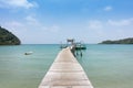 Wooden pier on the beach Beautiful tropical sea and blue sky of Royalty Free Stock Photo