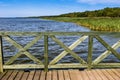 Wooden pier on big lake Lebsko in Poland. Royalty Free Stock Photo